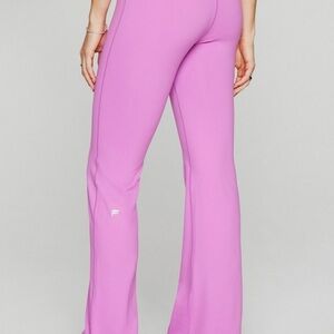Fabletics High-Rise Flare Leggings in Bright Pink